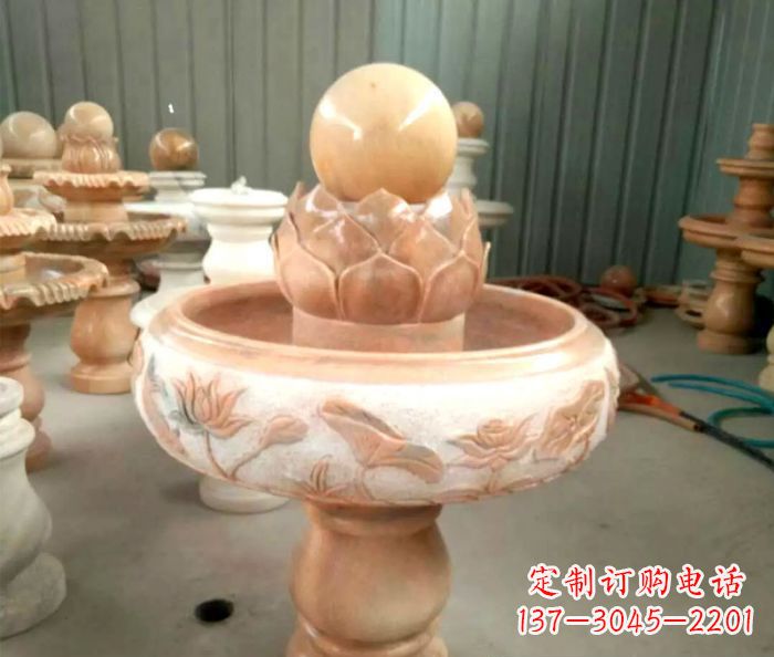 成都石来运转晚霞红风水球喷泉石雕