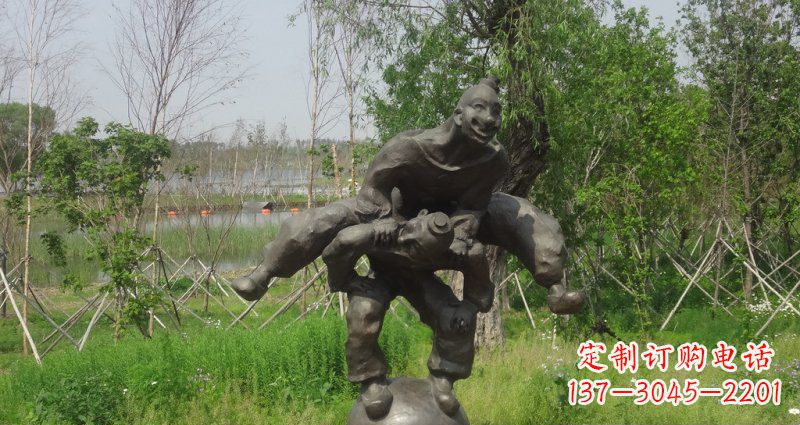 成都园林站在球上面跳山羊的人物景观铜雕